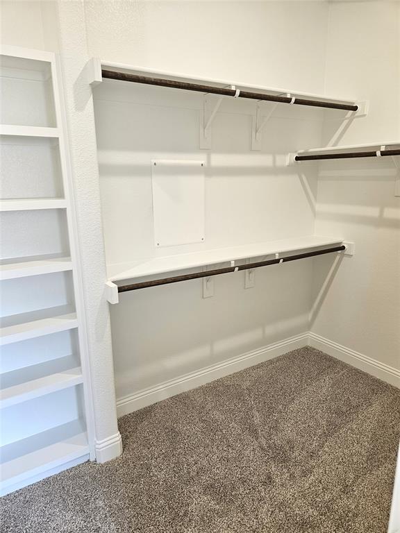 1453 Enloe Road Howe, TX 75459 - Photo 26 of 33 a view of an empty walk in closet