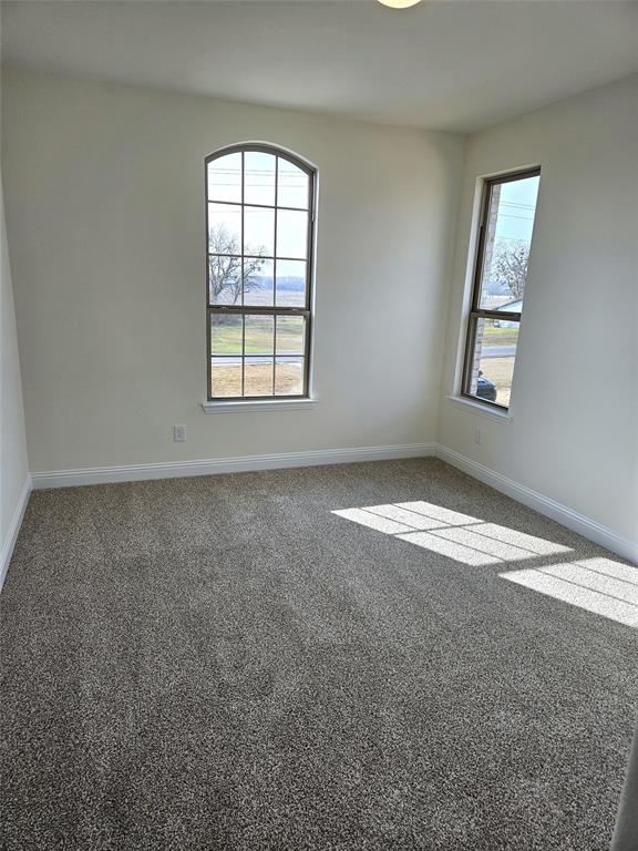 1453 Enloe Road Howe, TX 75459 - Photo 29 of 33 an empty room with a window