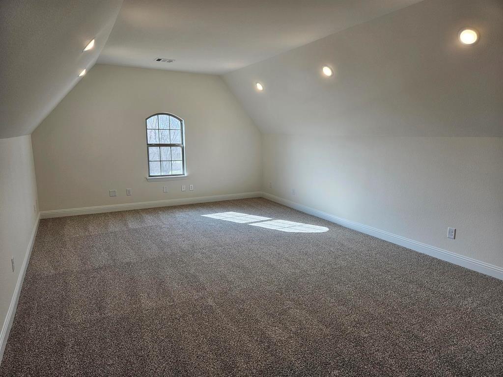 1453 Enloe Road Howe, TX 75459 - Photo 31 of 33 an empty room with a empty space and window