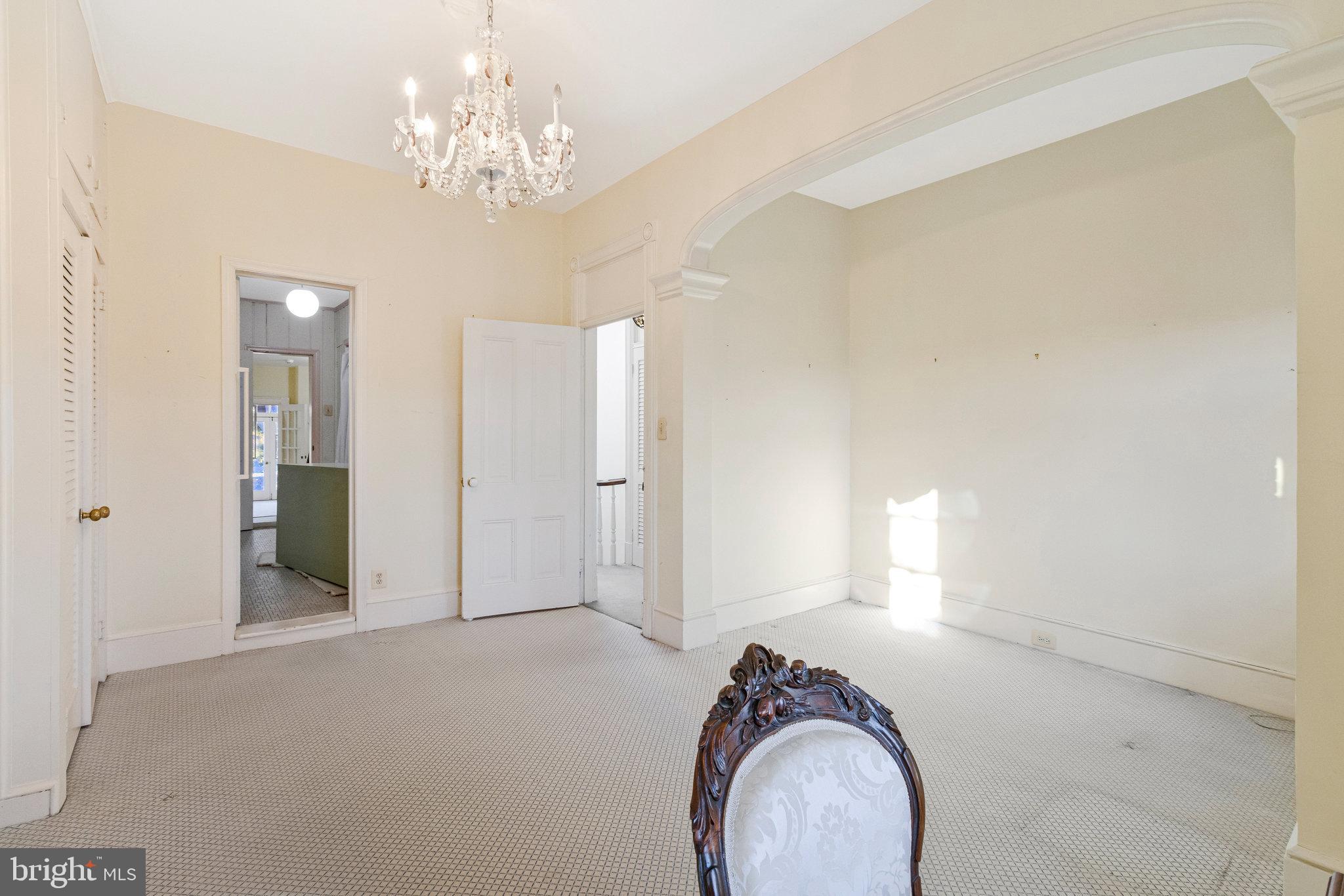 626 A Street Northeast Washington, DC 20002 - Photo 19 of 33 a view of a livingroom with a chandelier