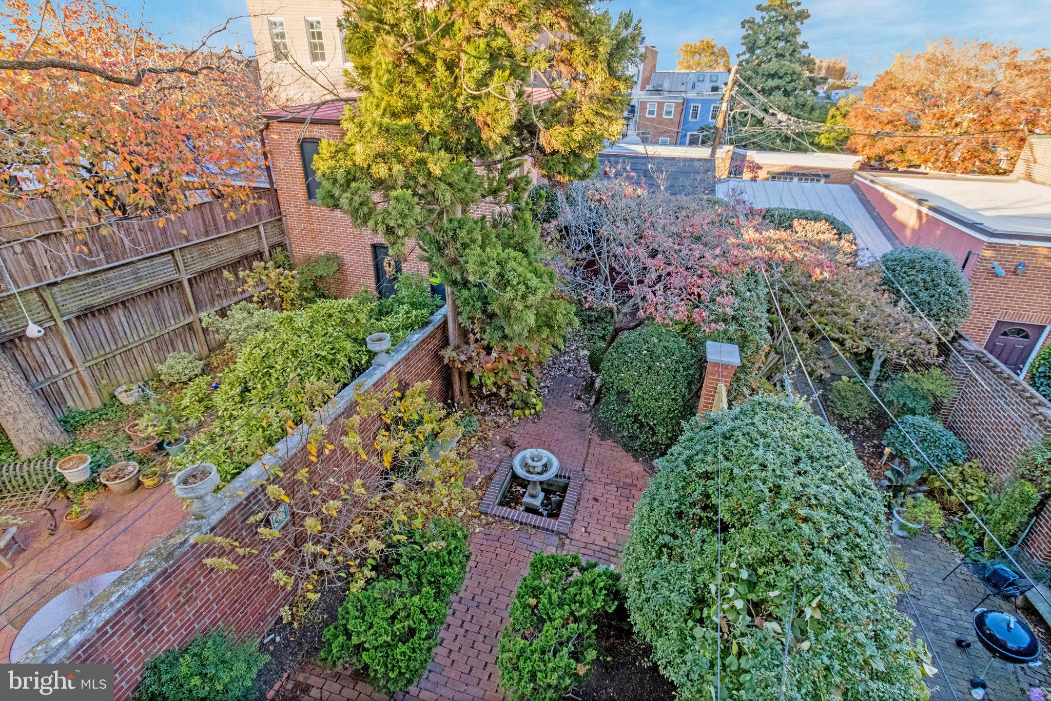 626 A Street Northeast Washington, DC 20002 - Photo 28 of 33 an aerial view of a house with a yard and garden