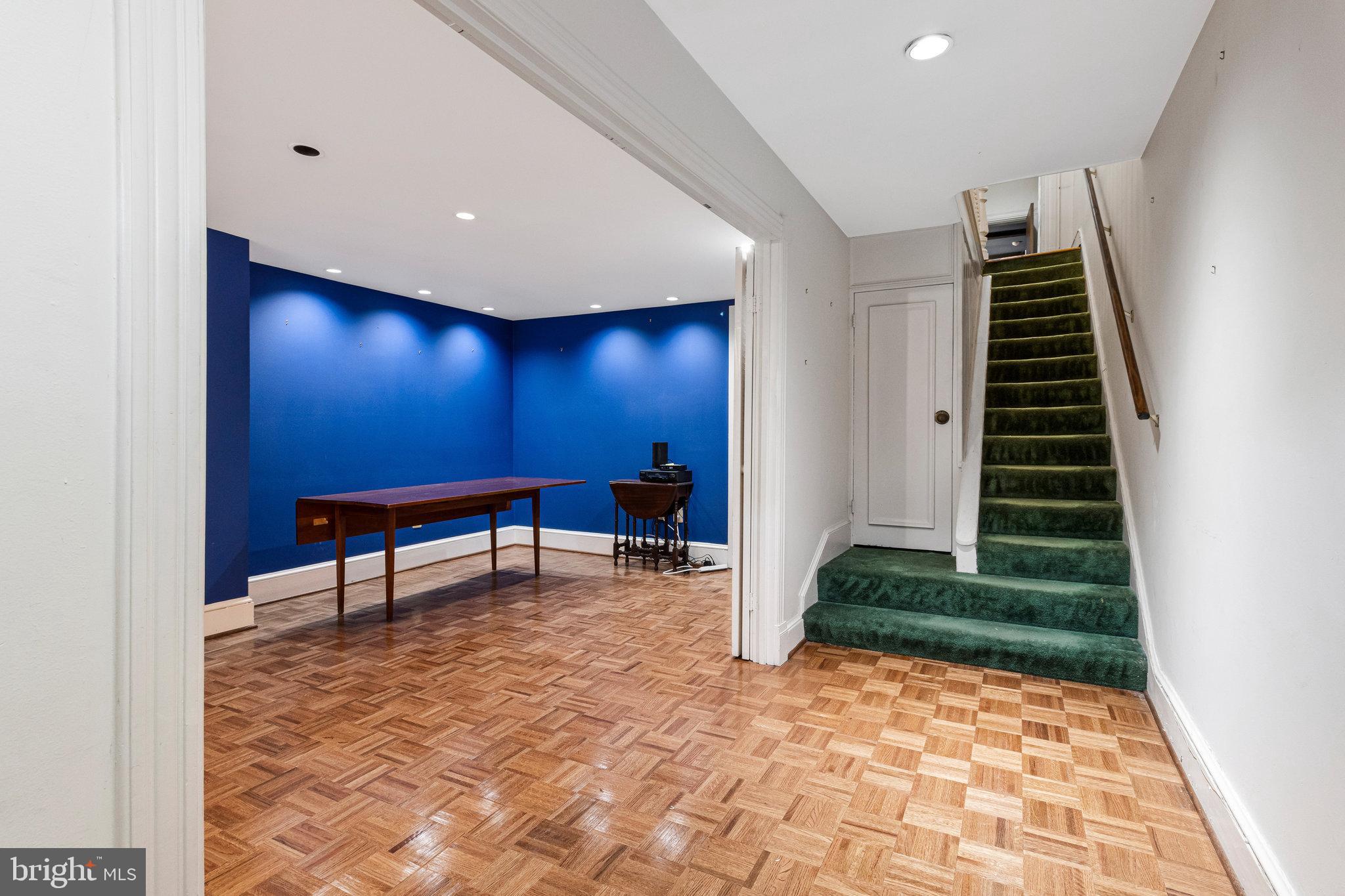 626 A Street Northeast Washington, DC 20002 - Photo 4 of 33 a view of a livingroom with a chair and potted plant