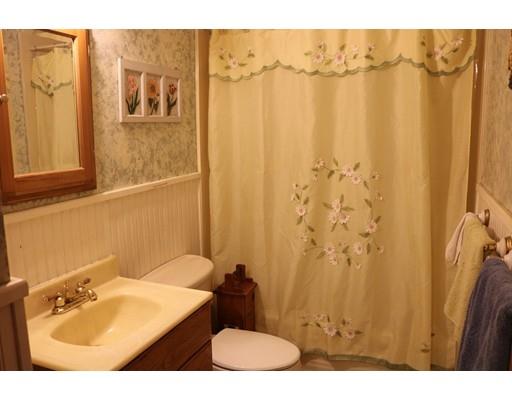 126 Arthur Street Springfield, MA 01104 - Photo 5 of 7 a bathroom with a sink and a mirror