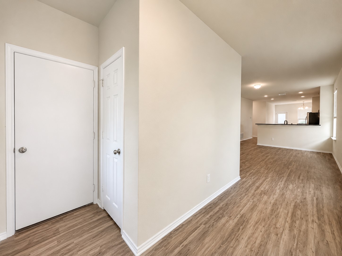 220 Pepperbark Loop Buda, TX 78610 - Photo 27 of 27 An inviting entrance foyer reveals seamless transition into a spacious open floor plan!
