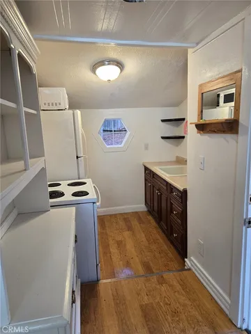 a view of outdoor space with a kitchen