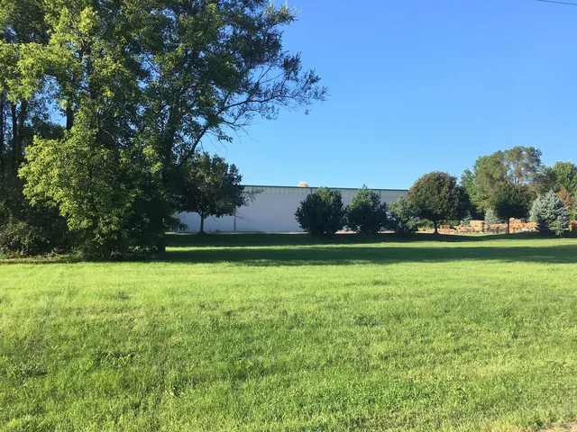 a view of outdoor space with deck and yard