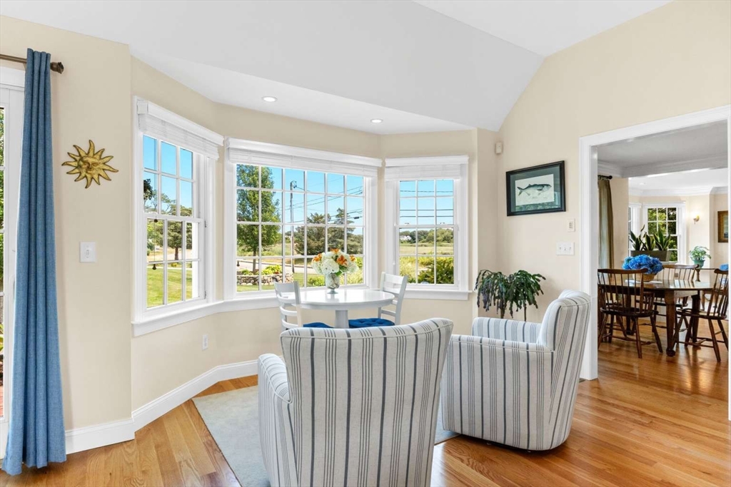 110 Commerce Road Barnstable, MA 02630 - Photo 11 of 41 a living room with furniture and large windows
