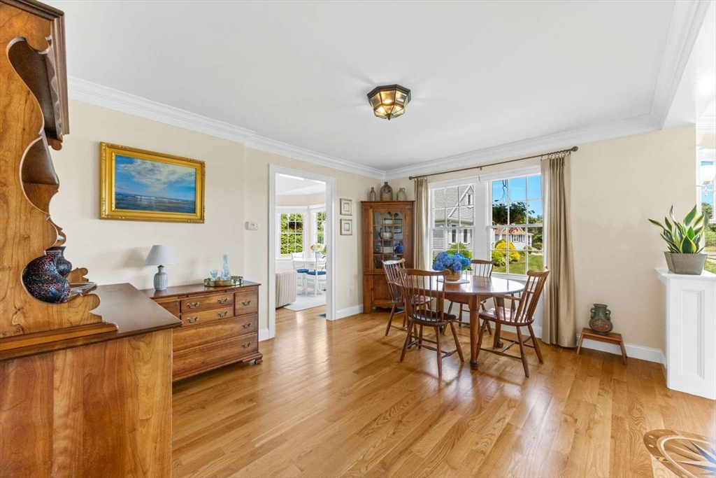 110 Commerce Road Barnstable, MA 02630 - Photo 22 of 41 a living room with furniture and wooden floor