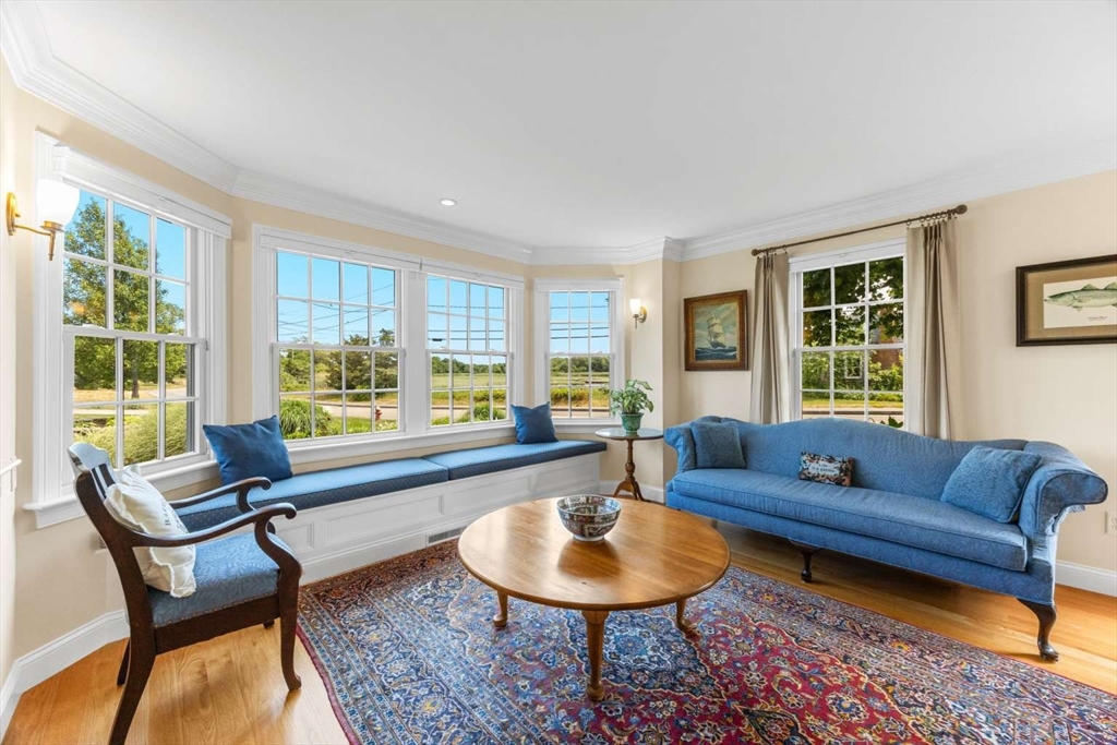 110 Commerce Road Barnstable, MA 02630 - Photo 24 of 41 a living room with furniture and a large window