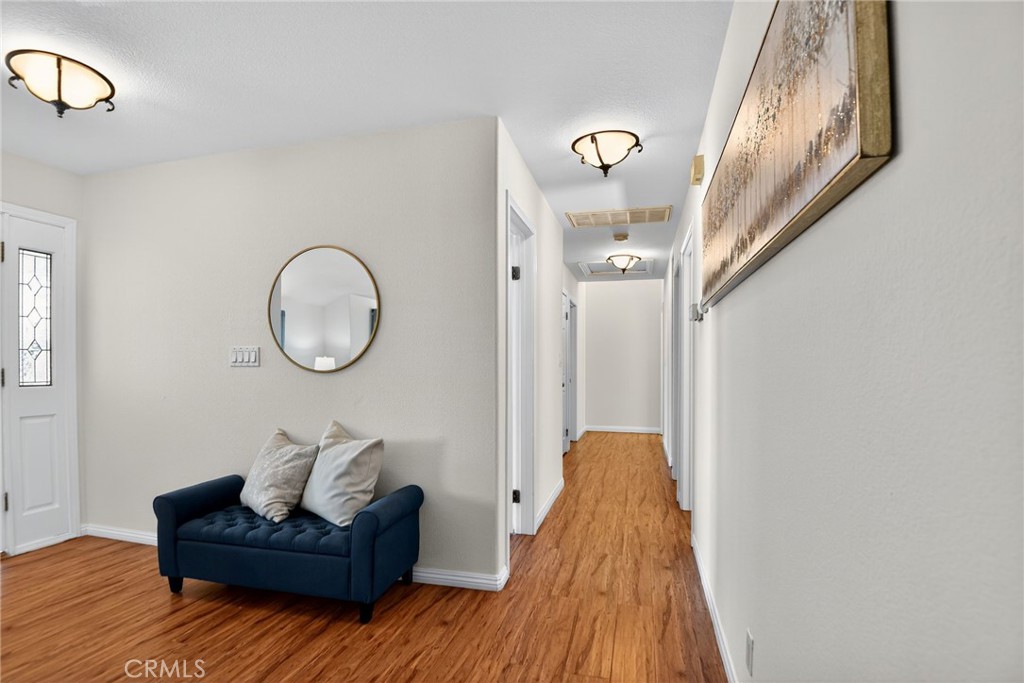 20122 Candleflame Court Walnut, CA 91789 - Photo 16 of 61 a living room with furniture and a wooden floor
