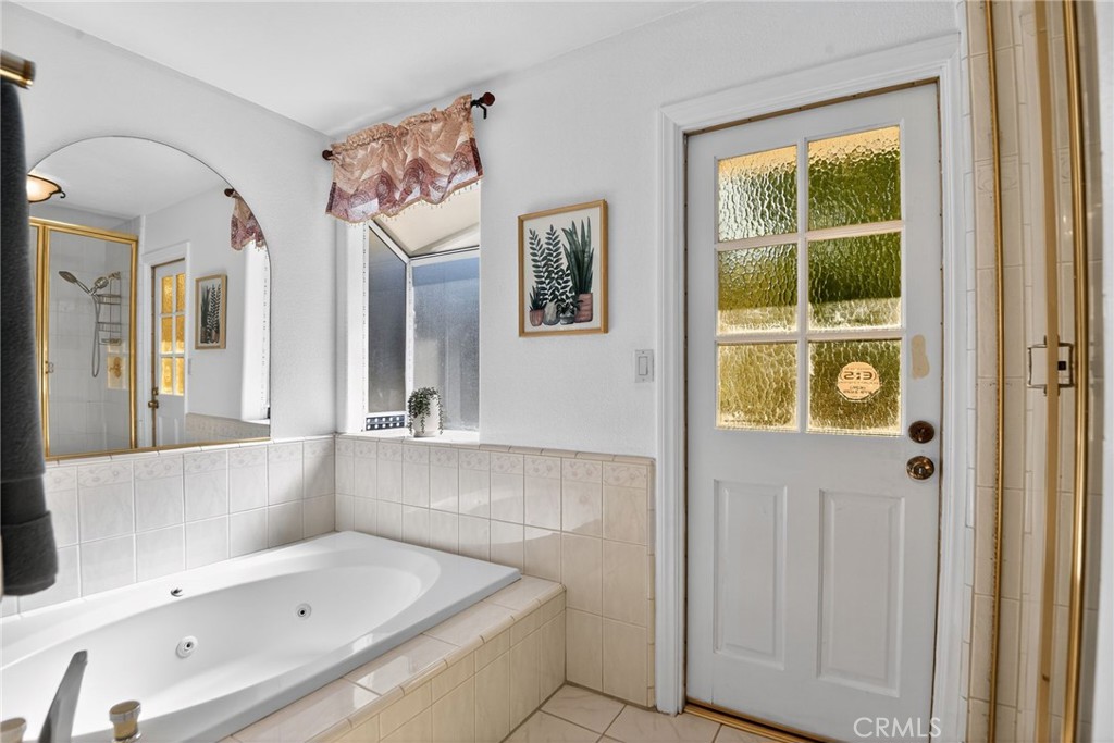 20122 Candleflame Court Walnut, CA 91789 - Photo 21 of 61 a bathroom with a tub and a window