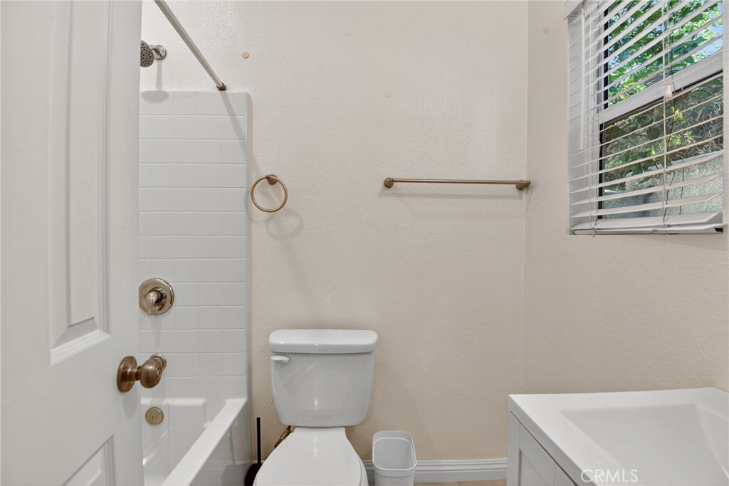 20122 Candleflame Court Walnut, CA 91789 - Photo 38 of 61 a bathroom with a sink a toilet and shower