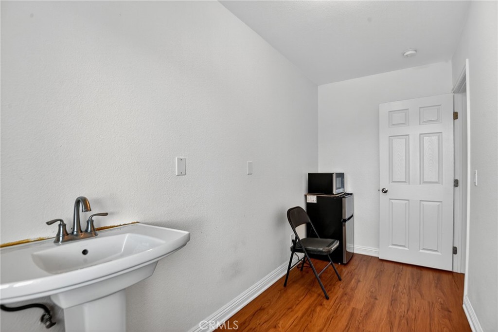 20122 Candleflame Court Walnut, CA 91789 - Photo 42 of 61 a view of a workspace with wooden floor