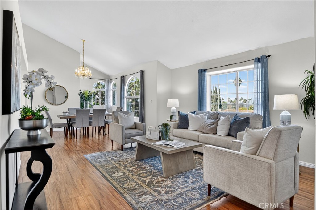 20122 Candleflame Court Walnut, CA 91789 - Photo 5 of 61 a living room with furniture a dining table and a large window