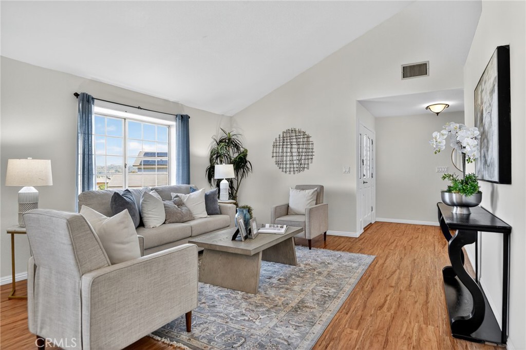 20122 Candleflame Court Walnut, CA 91789 - Photo 8 of 61 a living room with furniture a table and a potted plant