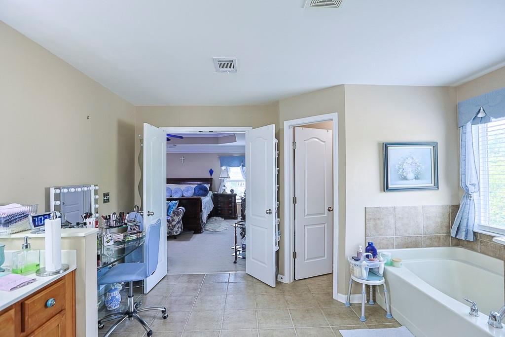 300 Hampton Place Canton, GA 30115 - Photo 64 of 82 a very nice looking room with a couch