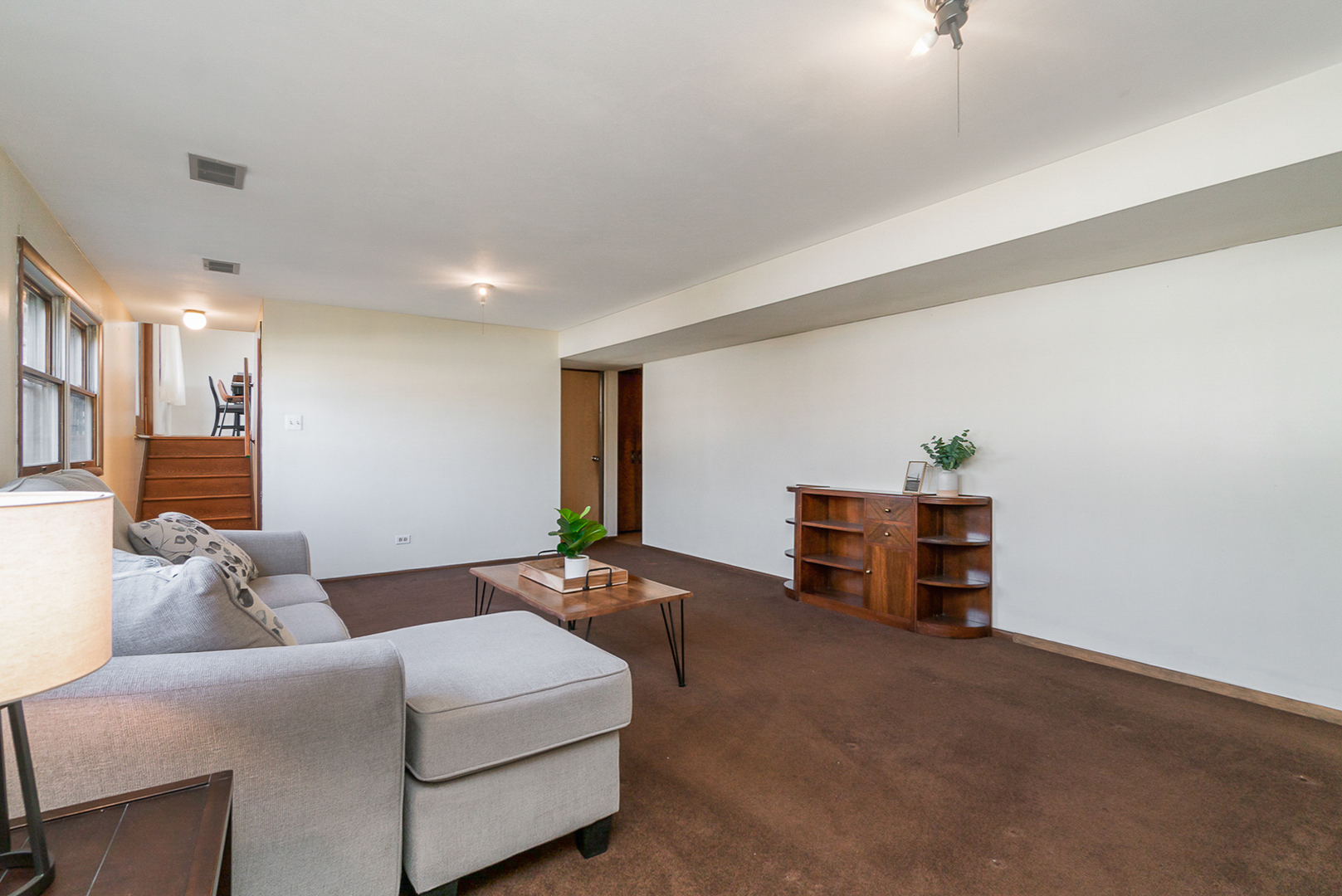 2832 193rd Street Lansing, IL 60438 - Photo 14 of 25 a living room with furniture and a couch