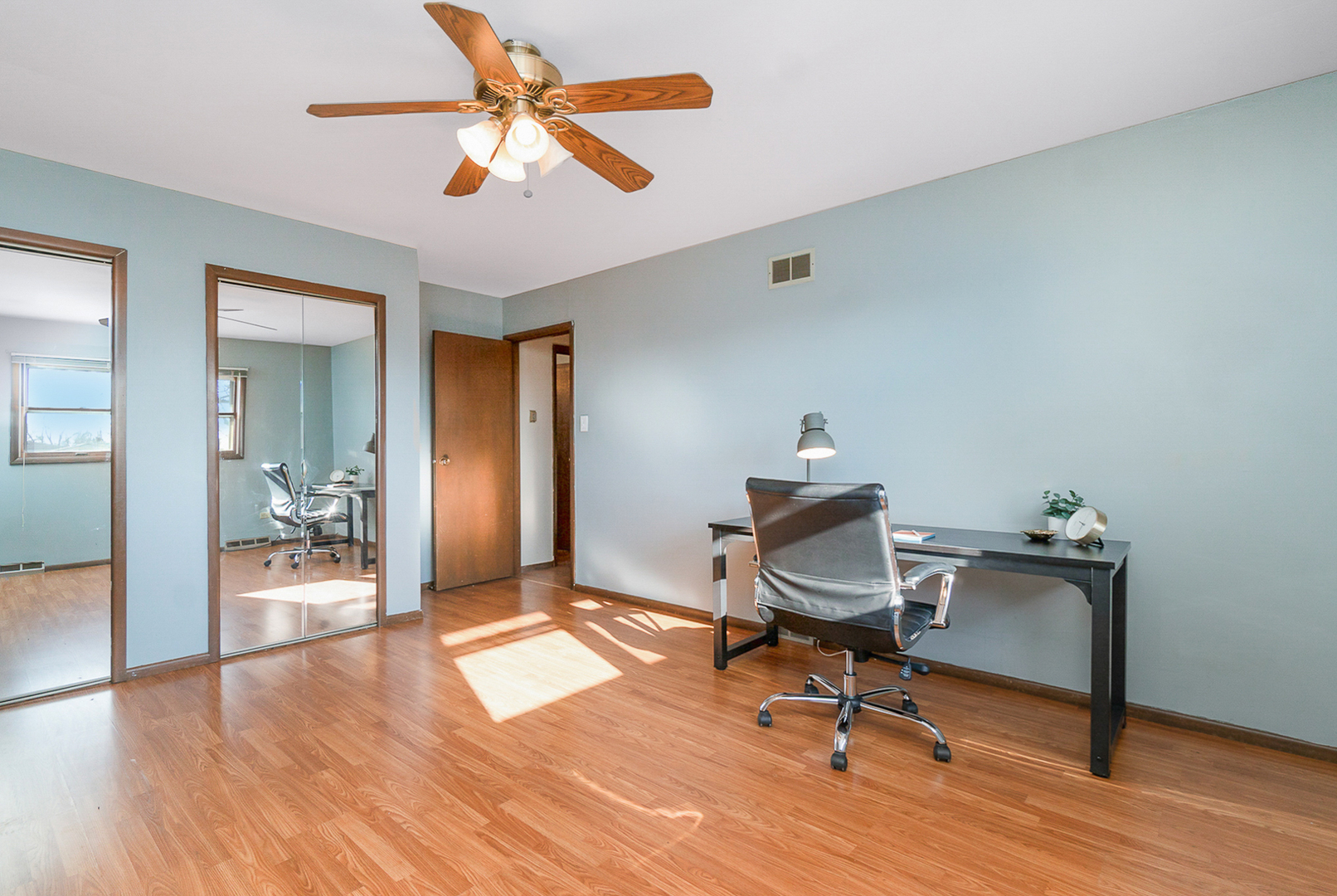 2832 193rd Street Lansing, IL 60438 - Photo 22 of 25 a workspace with furniture and wooden floor