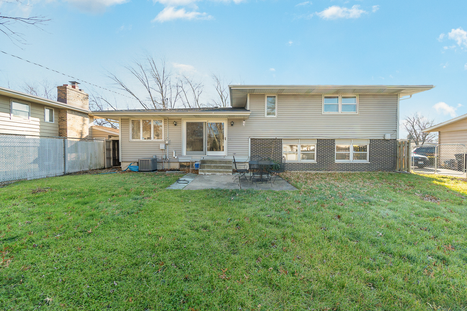 2832 193rd Street Lansing, IL 60438 - Photo 25 of 25 a front view of a house with a yard