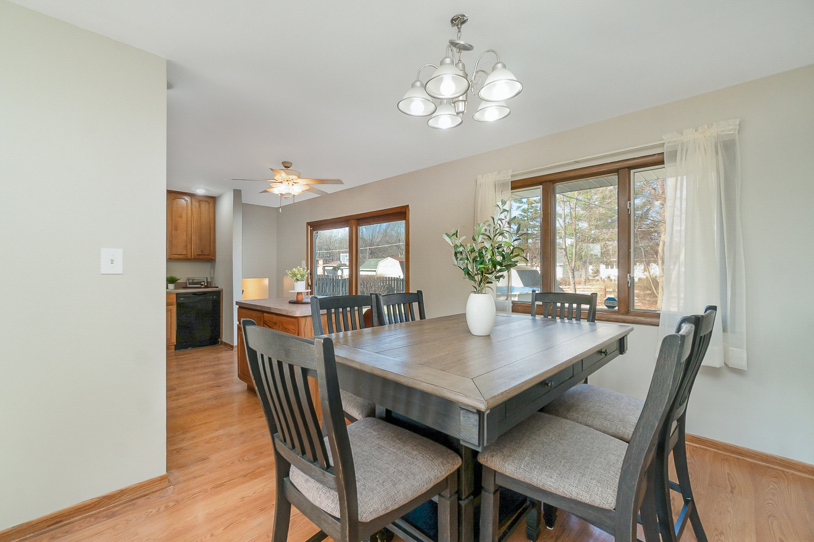 2832 193rd Street Lansing, IL 60438 - Photo 9 of 25 a view of a dining room with furniture window and wooden floor
