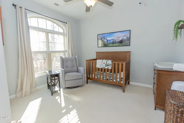 a bedroom with furniture and a couch