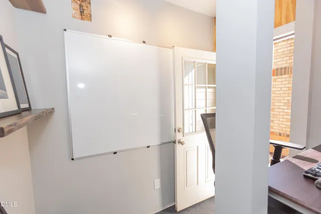 a workspace with furniture and lamp