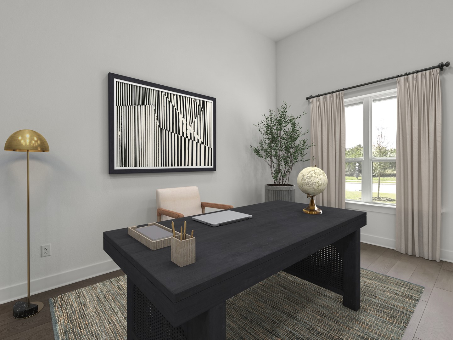 2508 Chiavari Way Leander, TX 78641 - Photo 18 of 24 An inviting home office boasts a generously sized dark-toned desk, ideal for focused work.