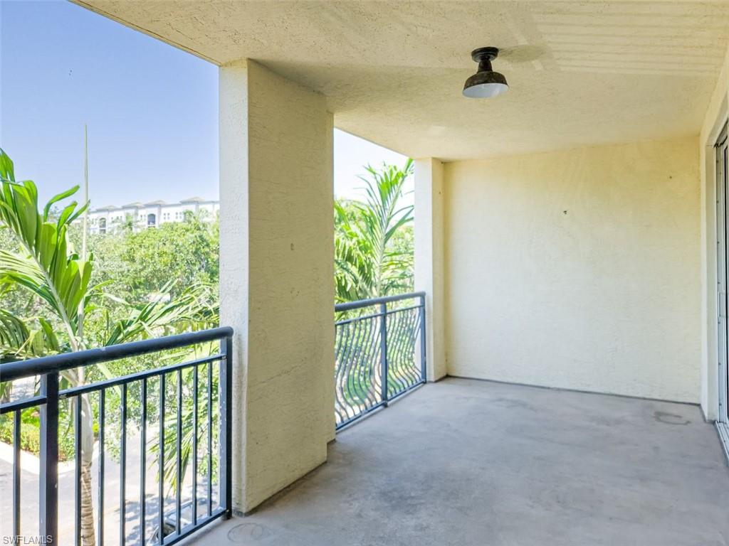 1312 Renaissance Way, Unit 312 Boynton Beach, FL 33426 - Photo 22 of 23 a view of hallway with a plant