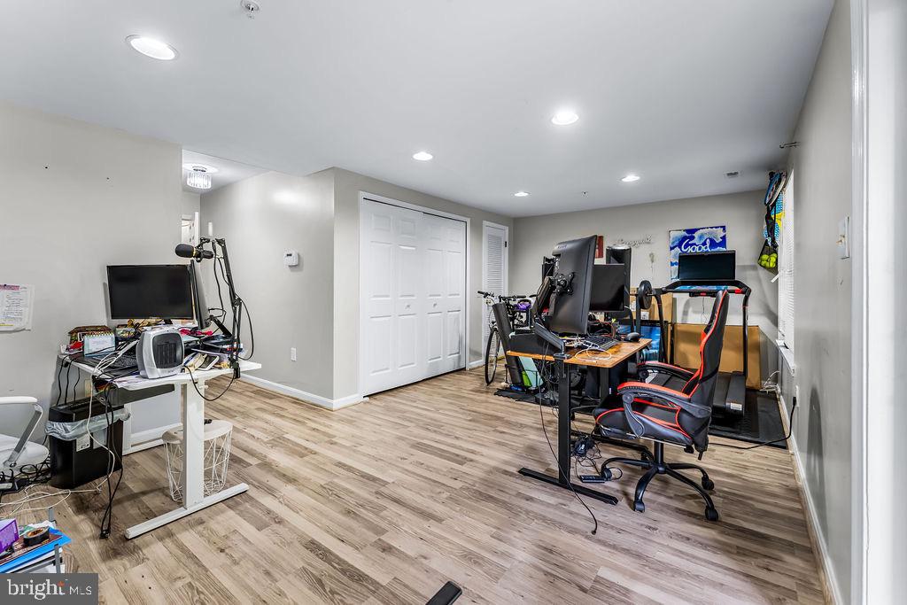 11409 Hermosa Drive Laurel, MD 20708 - Photo 25 of 28 a view of a workspace with furniture and a gym