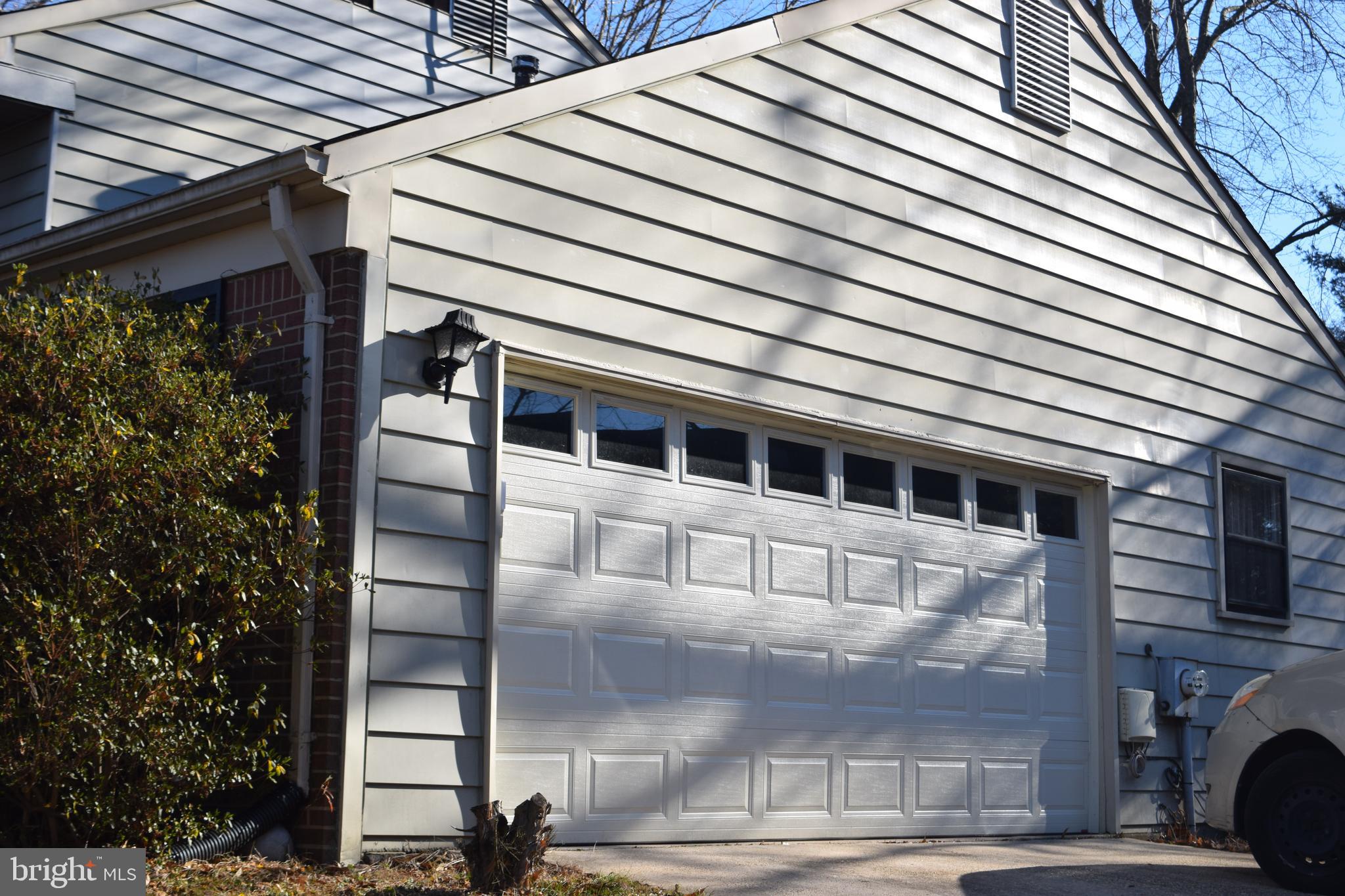 14009 Pond View Road Silver Spring, MD 20905 - Photo 4 of 11 a front view of a building with street