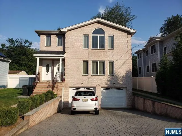 a car parked in front of a house