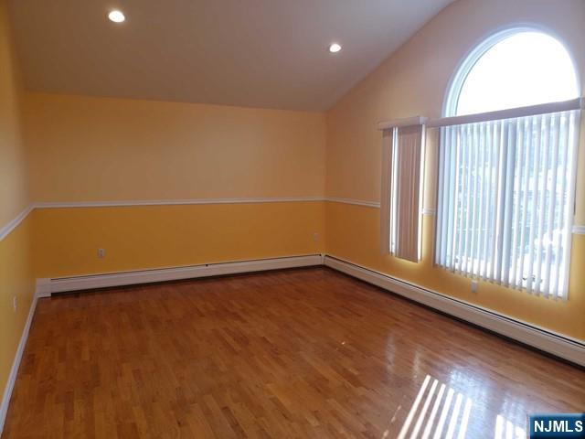 478 Walnut Street Ridgefield, NJ 07657 - Photo 3 of 26 a view of an empty room and a window