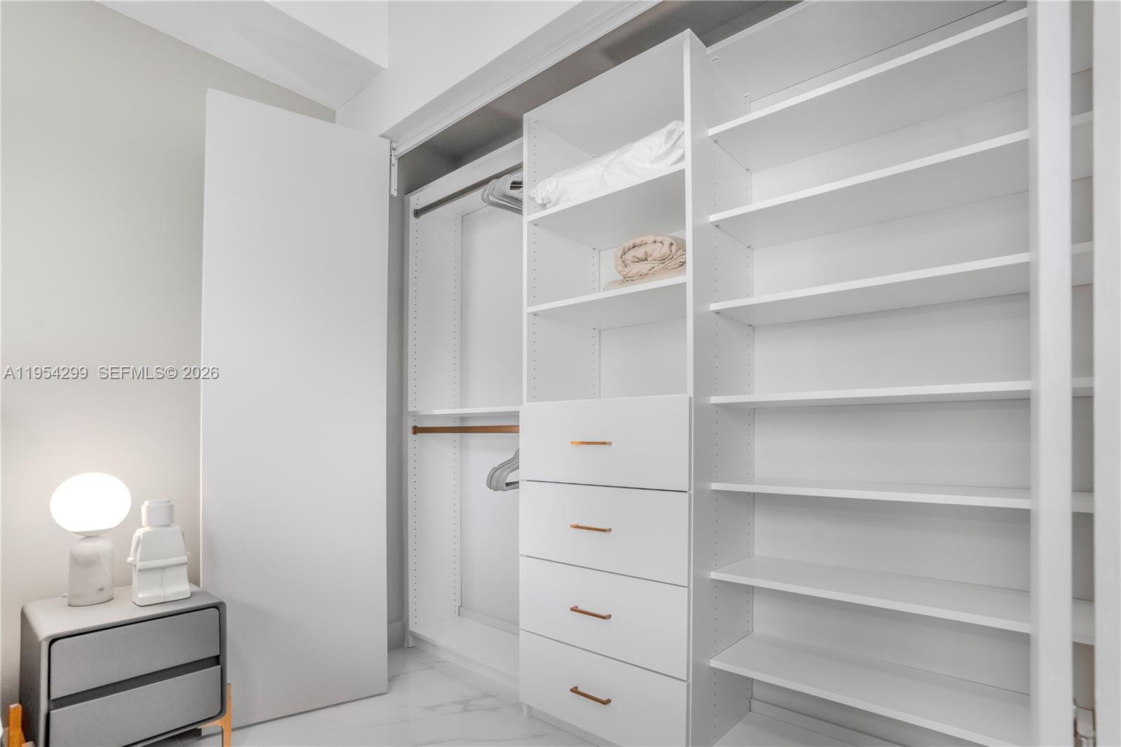 700 Northeast 24th Street, Unit 901 Miami, FL 33137 - Photo 46 of 59 a view of an empty walk in closet