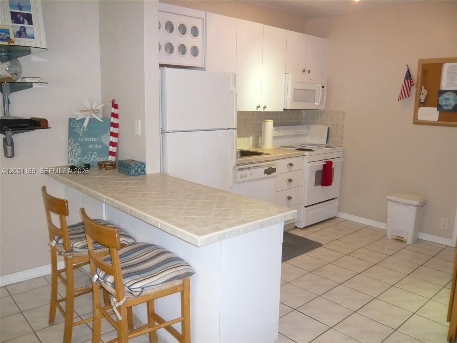 3300 North Surf Road, Unit 9A Hollywood, FL 33019 - Photo 8 of 16 BAR STOOL