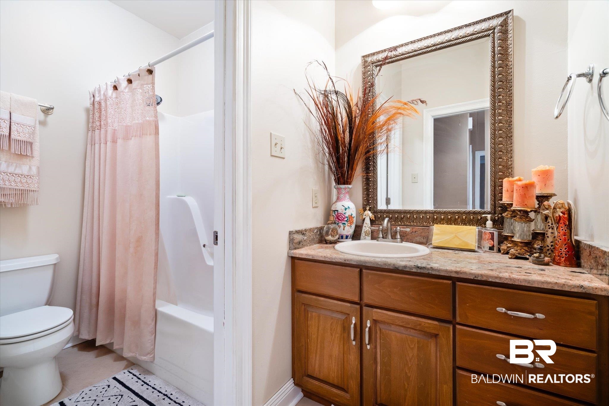 2400 Waterford Road Semmes, AL 36575 - Photo 19 of 30 Full bath with vanity, shower / tub combo with curtain, and tile patterned floors