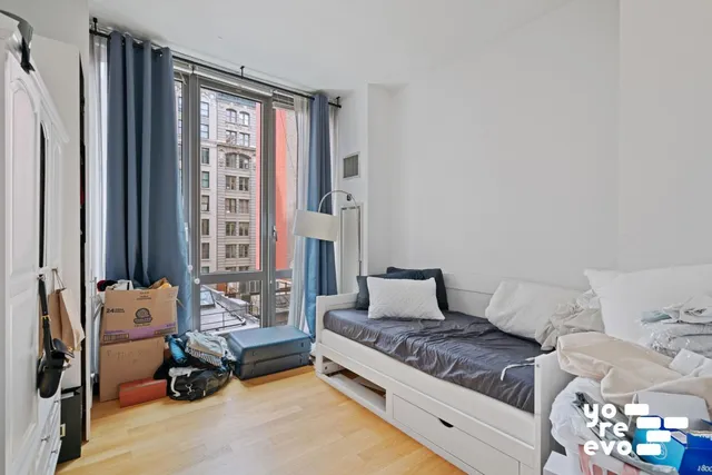 a bathroom with a double vanity sink mirror and toilet
