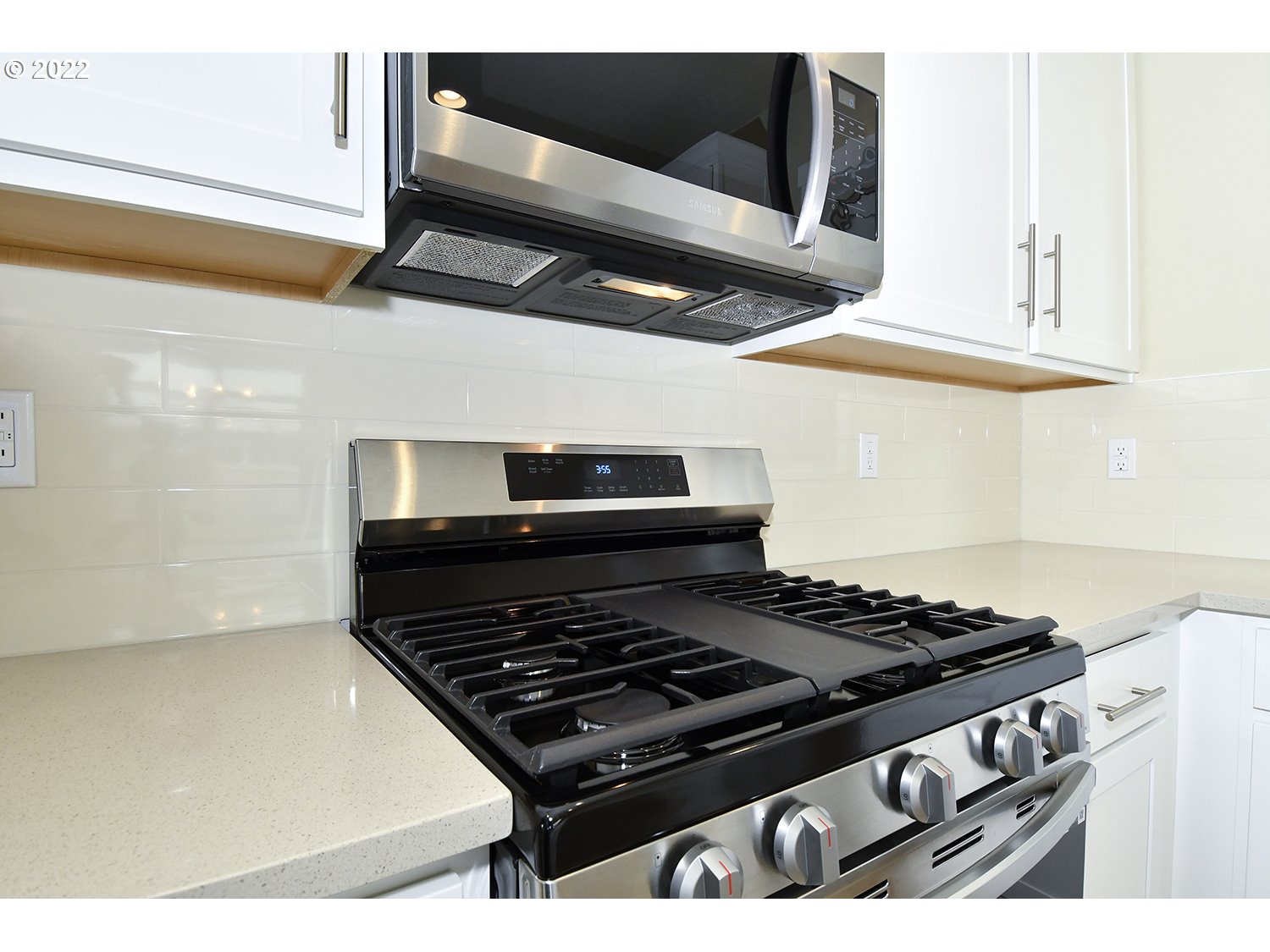 4791 Southwest 179th Avenue Beaverton, OR 97078 - Photo 12 of 27 a stove top oven sitting inside of a kitchen