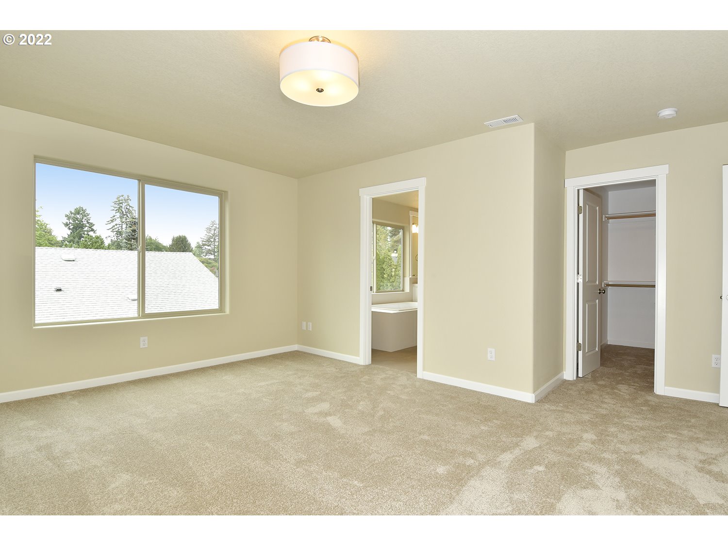 4791 Southwest 179th Avenue Beaverton, OR 97078 - Photo 16 of 27 a view of an empty room with a window