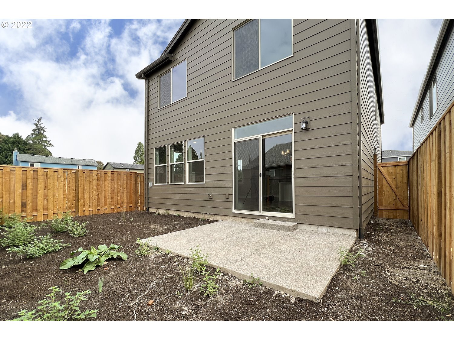 4791 Southwest 179th Avenue Beaverton, OR 97078 - Photo 3 of 27 a front view of a house with a garden