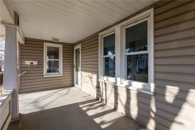 a view of a house with a large window