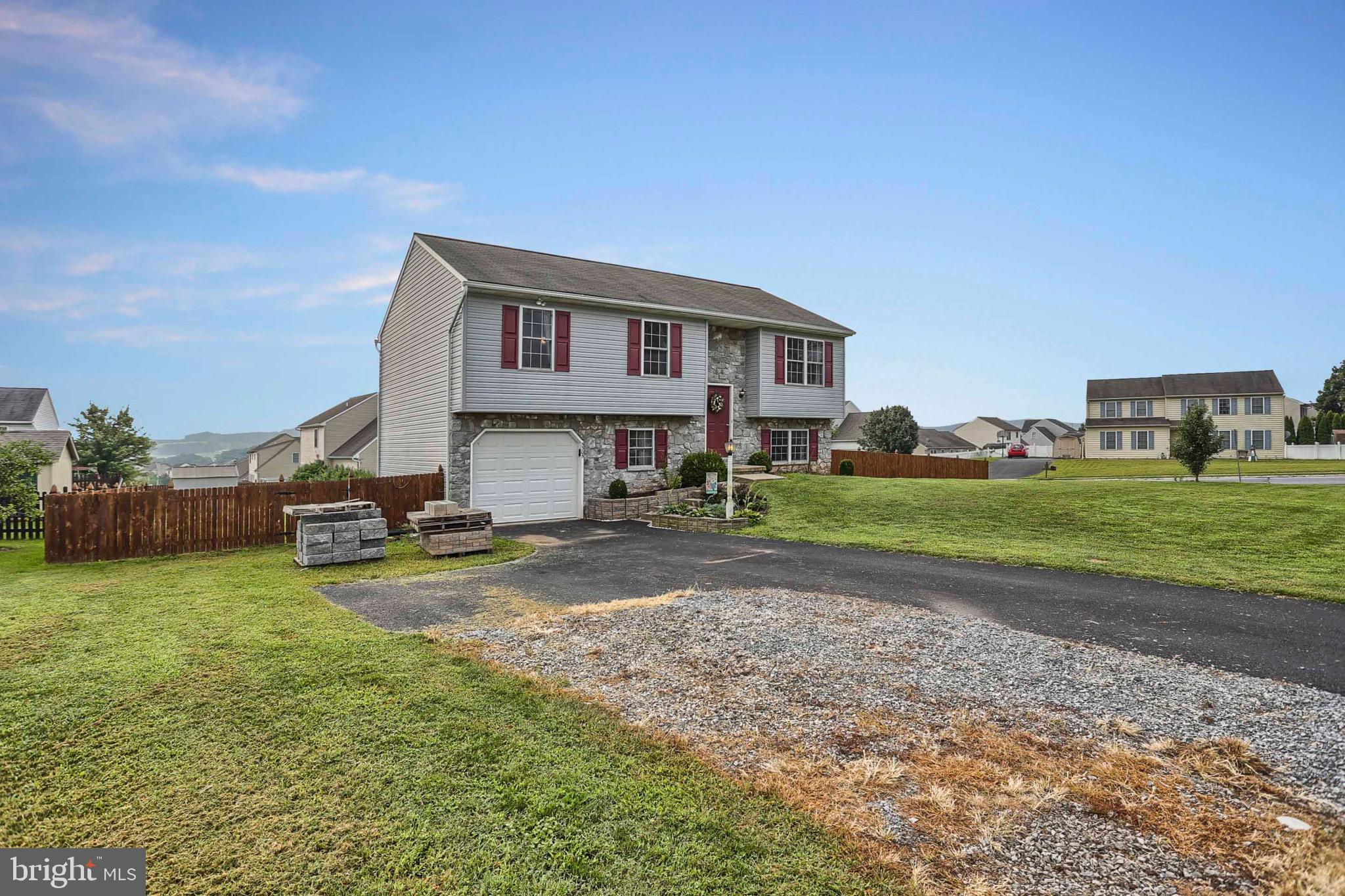 5305 Board Road Mount Wolf, PA 17347 - Photo 5 of 44 Front Elevation showing paved and gravel driveway