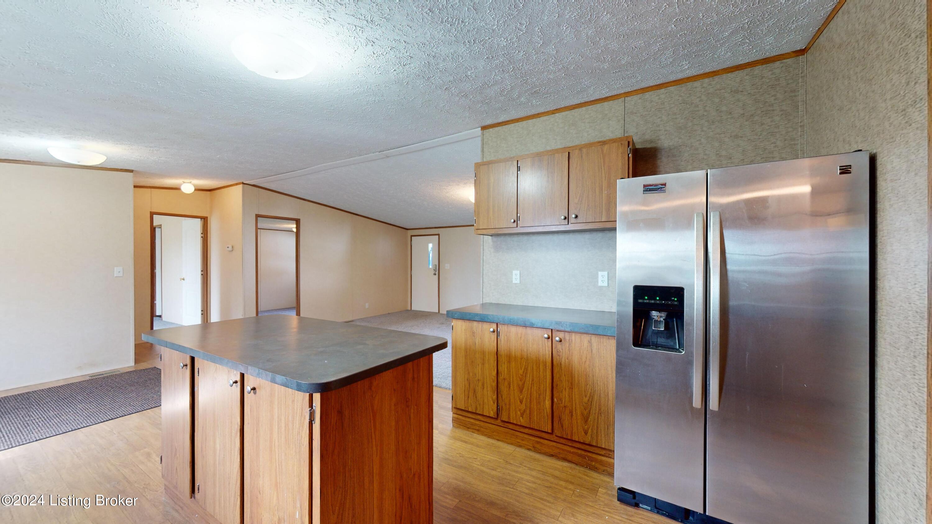 686 Windy Ridge Road Bedford, KY 40006 - Photo 6 of 42 view 2 of the kitchen complete with island for food prep