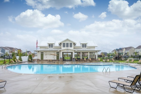 1203 June Wilde Ridge Spring Hill, TN 37174 - Photo 18 of 20 a view of a swimming pool with a lake view