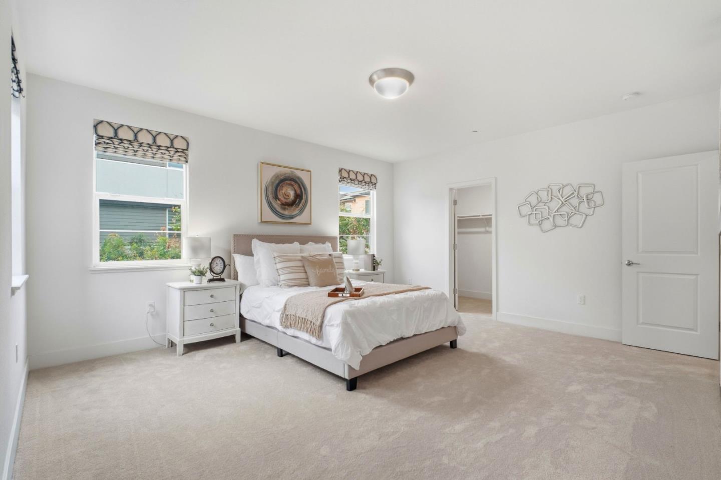 385 Line Street Hayward, CA 94544 - Photo 22 of 38 a bed room with a bed and two windows