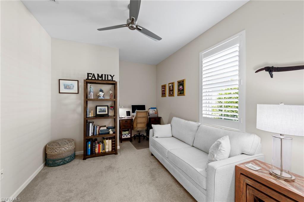 20179 Torch Key Way Estero, FL 33928 - Photo 14 of 41 a living room with furniture and a window