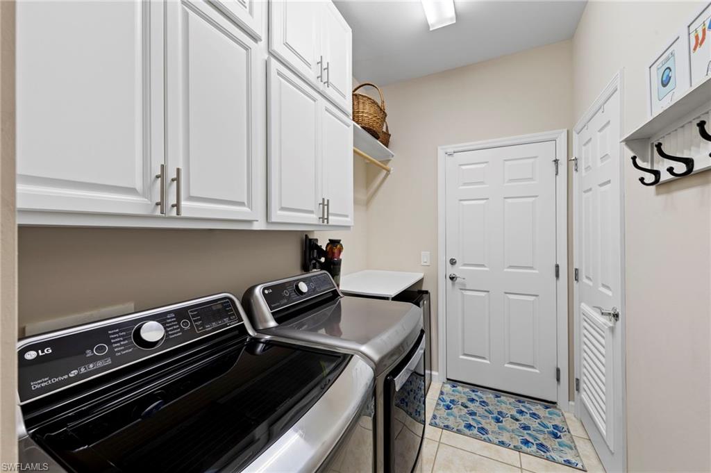 20179 Torch Key Way Estero, FL 33928 - Photo 24 of 41 a view of a storage and utility room with racks on the wall