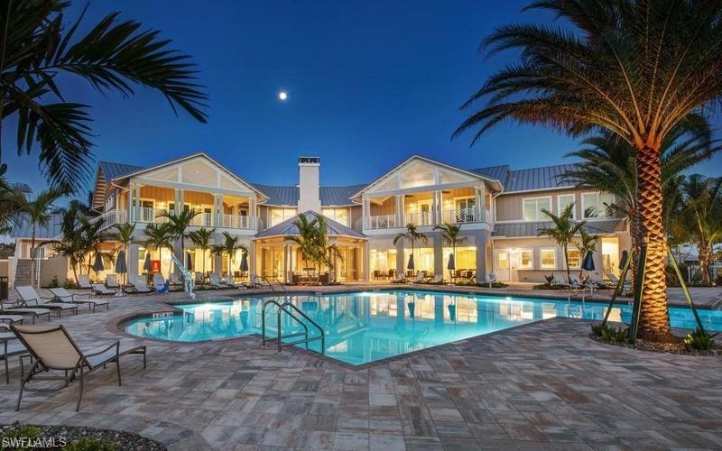 20179 Torch Key Way Estero, FL 33928 - Photo 35 of 41 a view of a house with a yard