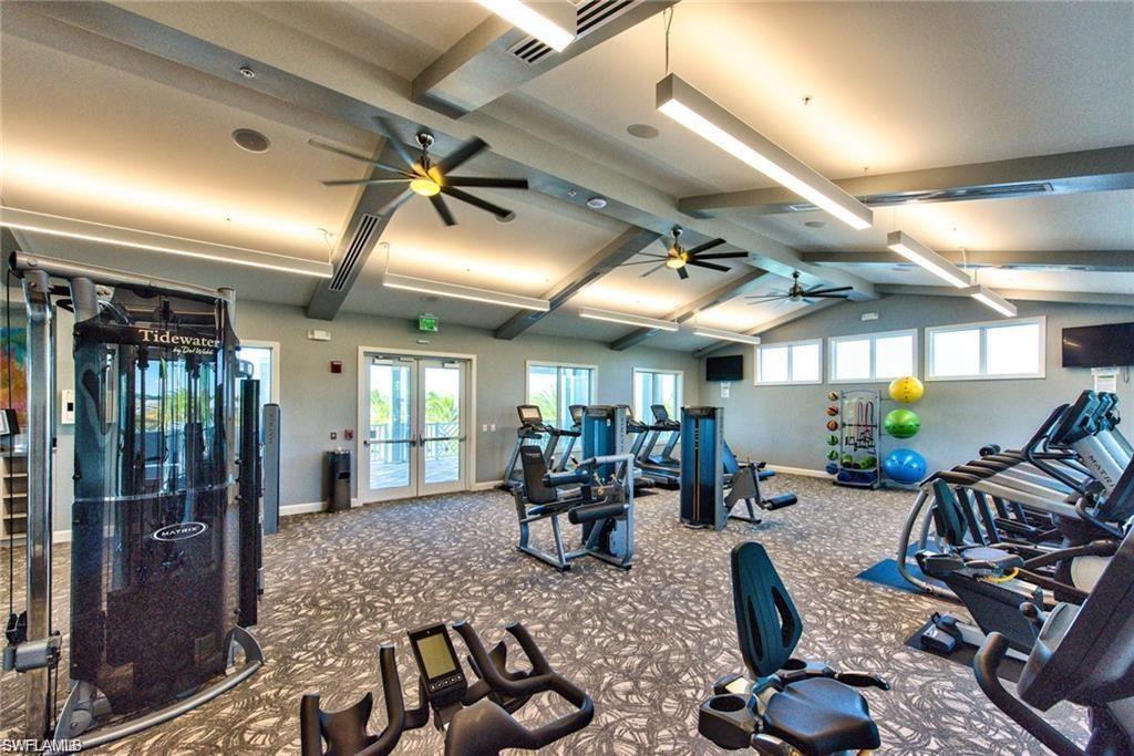 20179 Torch Key Way Estero, FL 33928 - Photo 38 of 41 a very nice looking room with gym equipment