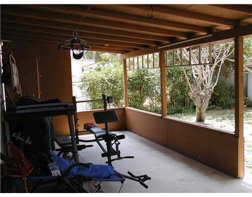 5852 South Rue Road West Palm Beach, FL 33415 - Photo 6 of 7 a view of a workspace with furniture and a window