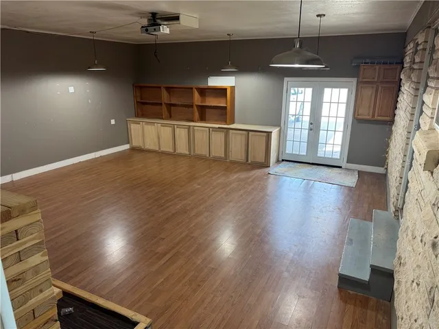 a view of a livingroom with wooden floor